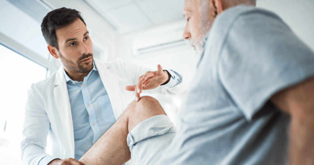 Current image: |doctor examining patient's knee