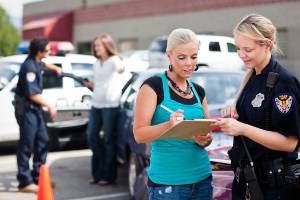 woman talking to police about a crash